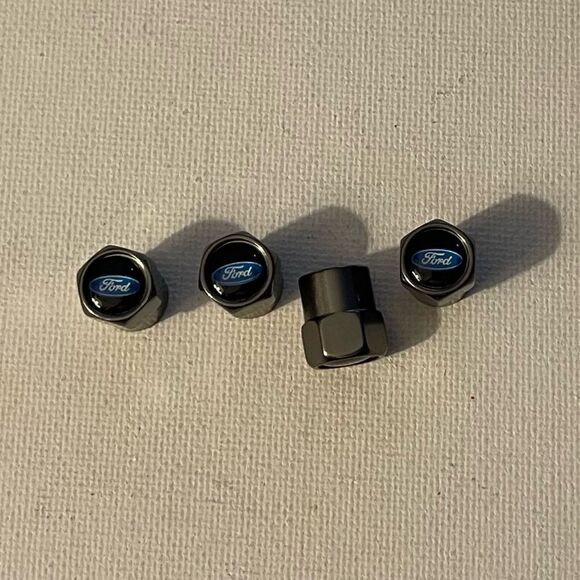 Ford valve Stem caps in Gray set of 4 NWT - Picture 1 of 4